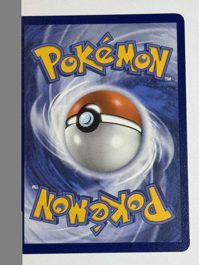 Team Rocket's Meowth (arka)